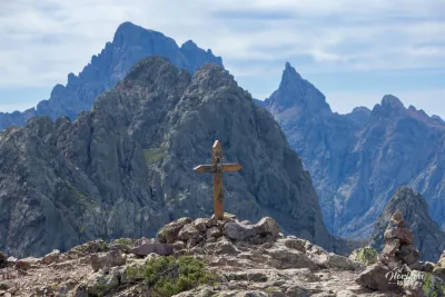 Paglia Orba and Capu Tafunatu behind the summit cross Paglia Orba and Capu Tafunatu behind the summit cross