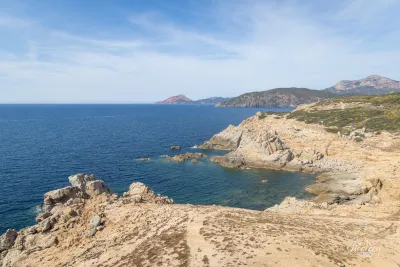 Gulf of Chiuni, with Capo Rosso in the background Gulf of Chiuni, with Capo Rosso in the background