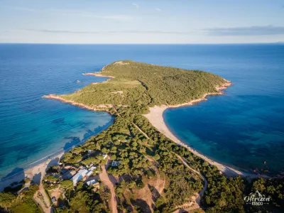 Rondinara peninsula (drone shot) Rondinara peninsula (drone shot)
