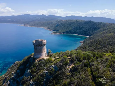 Genoese tower of Capo di Muro and Gulf of Ajaccio (drone shot) Genoese tower of Capo di Muro and Gulf of Ajaccio (drone shot)