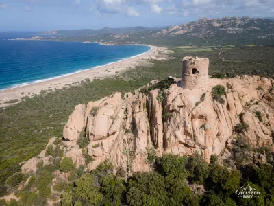 Genoese tower of Roccapina (drone shot) Genoese tower of Roccapina (drone shot)