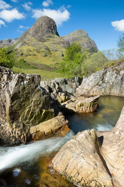 View of the Three Sisters of Glencoe, continuing eastwards on the A82 View of the Three Sisters of Glencoe, continuing slightly eastwards on the A82