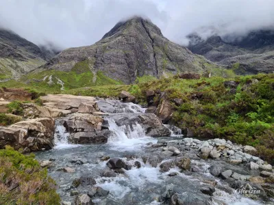 Fairy pools waterfalls in front of the magnificent Sgurr An Fheadain Fairy pools waterfalls in front of the magnificent Sgurr An Fheadain