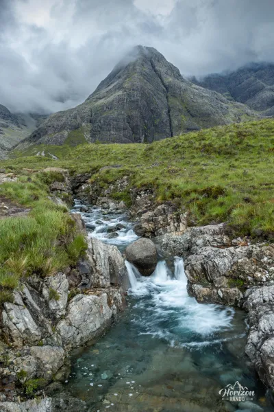Fairy pools waterfalls in front of the magnificent Sgurr An Fheadain Fairy pools waterfalls in front of the magnificent Sgurr An Fheadain