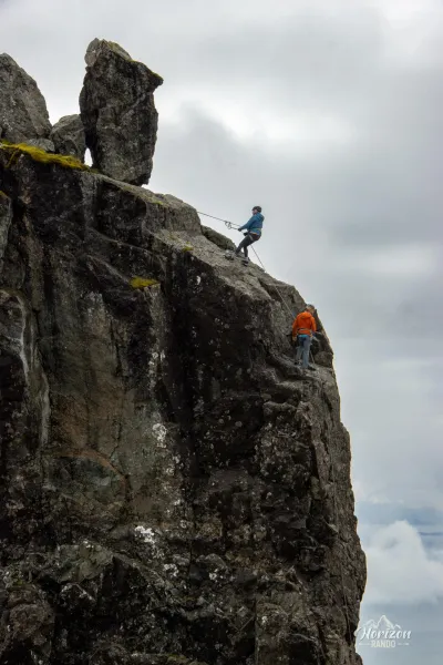 Rock climbers on The Inaccessible Pinnacle Rock climbers on The Inaccessible Pinnacle