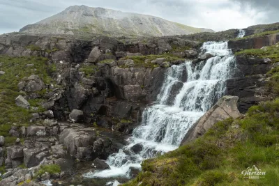 Waterfalls descending from Loch Coire Mhic Fhearchair Waterfalls descending from Loch Coire Mhic Fhearchair