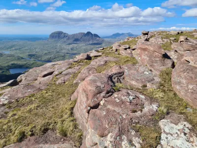 Just before the steep scree slope, the view opens onto an exceptional landscape Just before the steep scree slope, the view opens onto an exceptional landscape