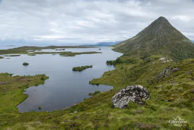 Lake Alnesvatnet and the peak of Storhornet on the right Lake Alnesvatnet and the peak of Storhornet on the right