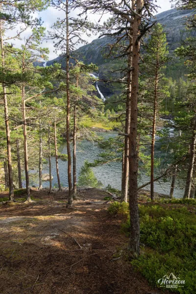 Very pleasant forest trail, third waterfall in the distance Very pleasant forest trail, third waterfall in the distance