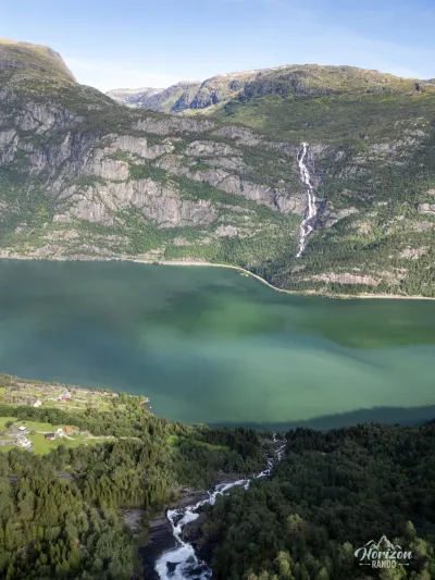 Strandfossen waterfall below (drone shot) Strandfossen waterfall below (drone shot)