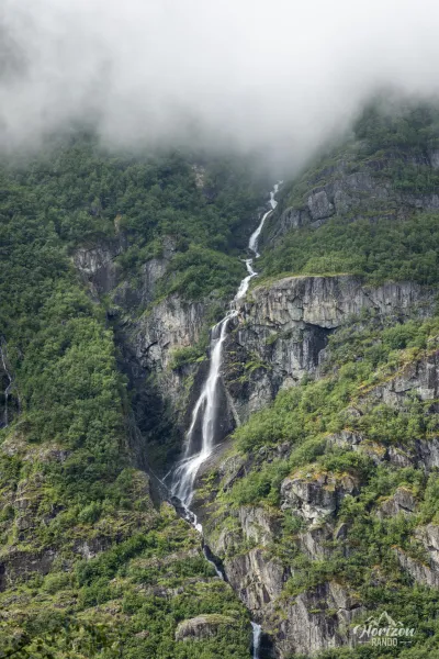 Waterfall facing the valley Waterfall facing the valley