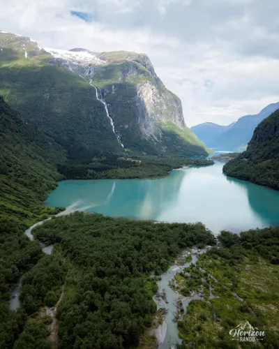 Lake Lovatnet and Ramnefjellfossen waterfall (drone shot) Lake Lovatnet and Ramnefjellfossen waterfall (drone shot)