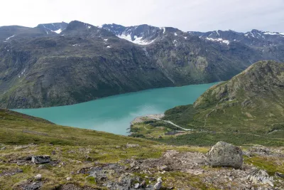Emerald green Lake Gjende, Memurubu, the start of the hike below Emerald green Lake Gjende, Memurubu, the start of the hike below