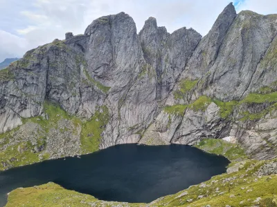 Austderdalsvatnet lake and Munken peak (797 m) on the right Austderdalsvatnet lake and Munken peak (797 m) on the right