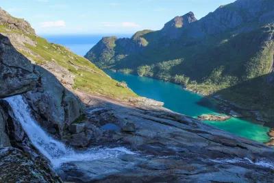 Waterfall and Djupfjorden Waterfall and Djupfjorden