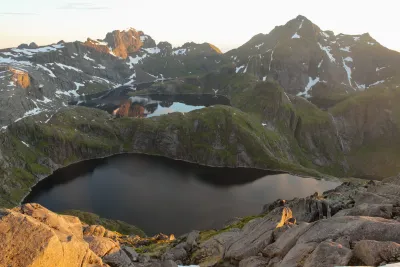 Tennesvatnet and Krokvatnet lakes in front of Breitinden (747 m) and Hermanndalstinden (1029 m) peaks Tennesvatnet and Krokvatnet lakes in front of Breitinden (747 m) and Hermanndalstinden (1029 m) peaks