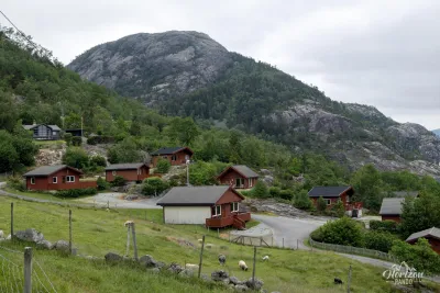 Lysefjorden Cabin village and Sokkanuten in the background Lysefjorden Cabin village and Sokkanuten in the background