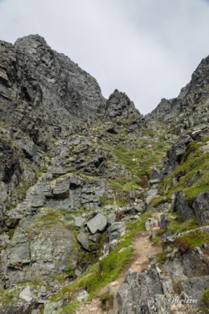 Steep couloir between Lake Storvatnet and the Tårnskaret pass Steep couloir between Lake Storvatnet and the Tårnskaret pass
