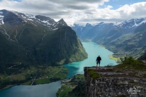 Contemplating the panorama from the summit Contemplating the panorama from the summit