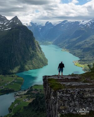 Contemplating the panorama from the summit Contemplating the panorama from the summit